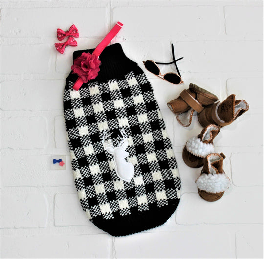 Designer dog sweater with deer in felt, flat lay showing design with dog accessories