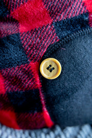Dog Pjs button detail, wooden button sewn onto bottom, side symmetrical