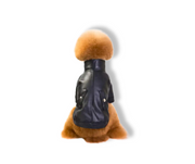 back side of pleather dog jacket in black with side pockets.