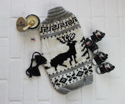 Large dog sweater with black and white design, flatlay shows dog accessories and elk design