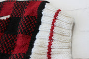 Close up of bottom band on wool knit sweater for dog.
